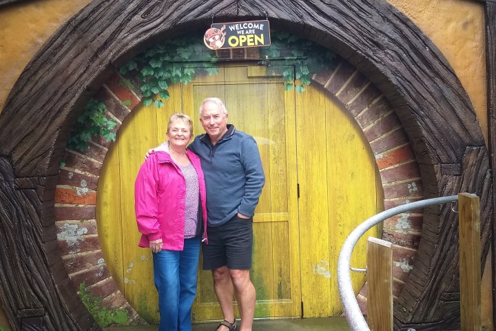 a person standing in front of a building