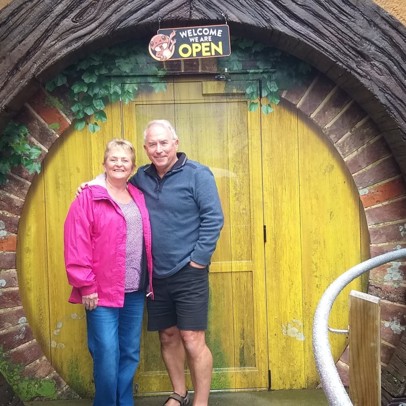 a person standing in front of a building