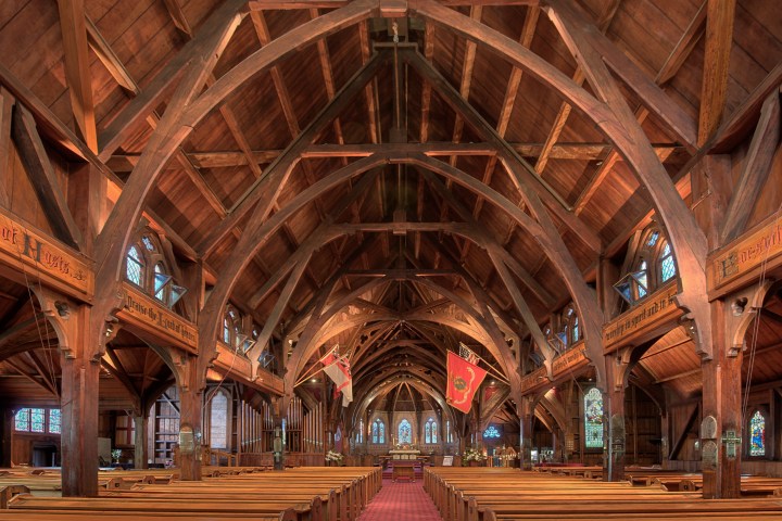 a group of people sitting at a train station