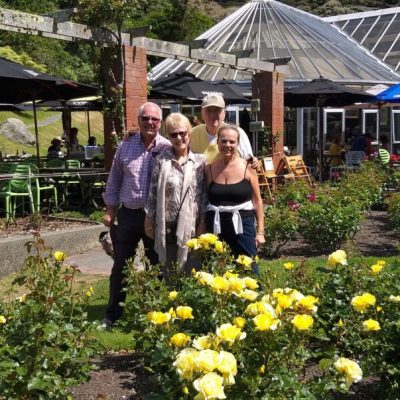 a person holding a flower garden